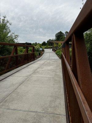 Bridge leading to the walking paths & playground