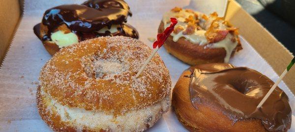 Spudnuts- Boston cream, maple bacon, cannoli and Nutella .