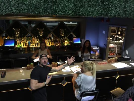 Bartending class in session at Elite Bartending School in South Beach.