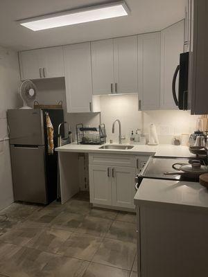 Kitchen after (before dishwasher and full size fridge install)