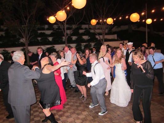 Lisa teaching everyone the cupid shuffle. That's a full dance floor!