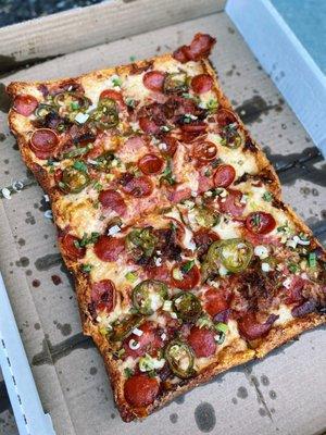 Fire House Special {pepperoni, bacon, sautéed jalapenos, green onions, choice of honey or ranch drizzle on the side}