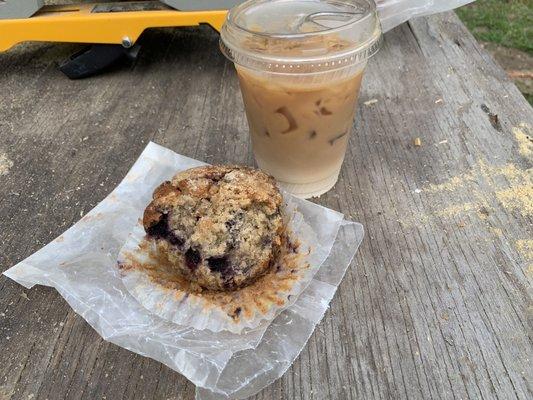 Brown butter blueberry muffin and iced chai latte with oat milk.