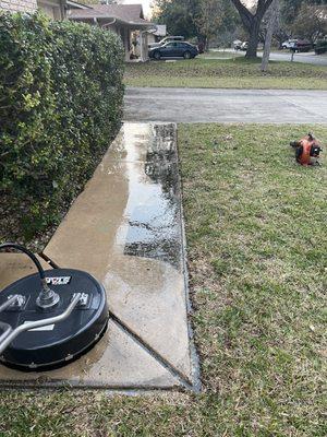 Power washing front walkway for customer