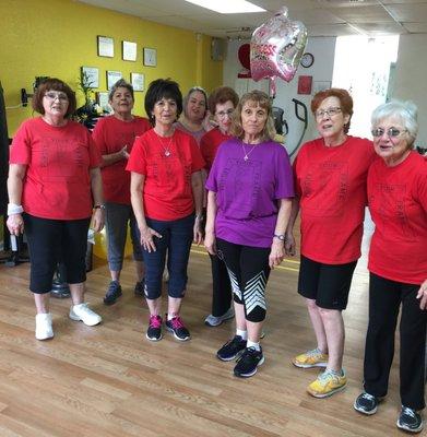 SilverSneaker Class ladies sharing an 80th birthday celebration.