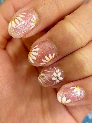 Gel nail polish with floral design and nails