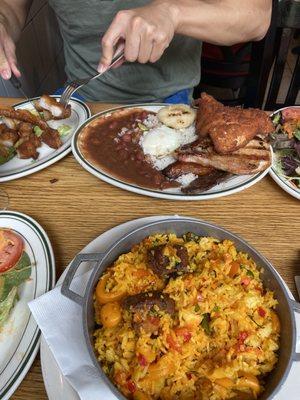 Yellow rice seafood with short ribs (different than what I expected on the ribs but still good , come with salad and plantains)