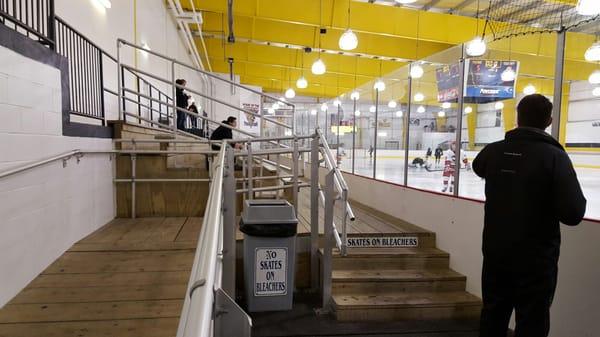 Wood bleachers.