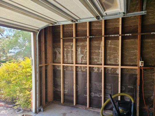 Subterranean Termites had completely compromised the framing in this garage wall and beneath the door header. We love framing!