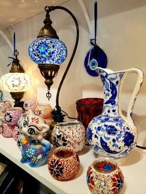 Stunning mosaic lamps, votive holders and statues.