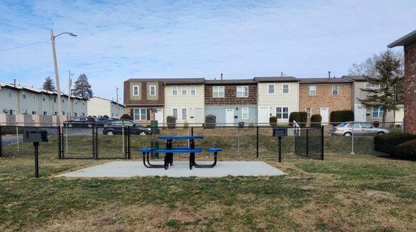 Picnic area by studio buildings