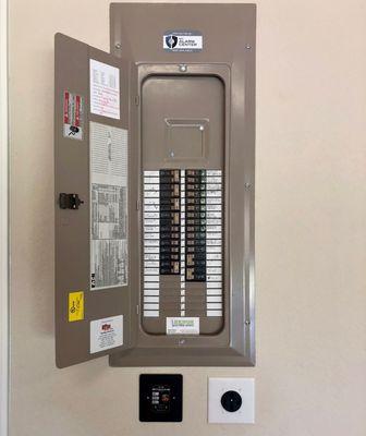 NEMA 14-50 and Whole Home Surge Device Installed below panel