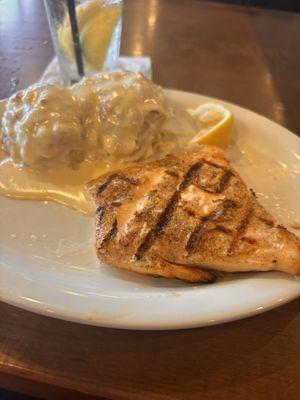 Grilled salmon with cheesy potatoes.