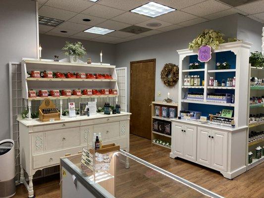 Our essential oils, diffusers, goat milk soaps, natural perfume, etc. And behind the buffet is our Ionic Foot Bath area.