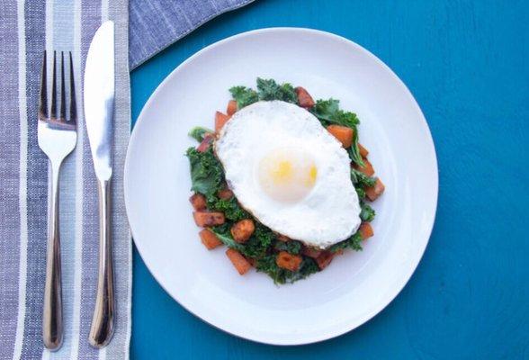 Sweet potato kale hash with sunny side egg.