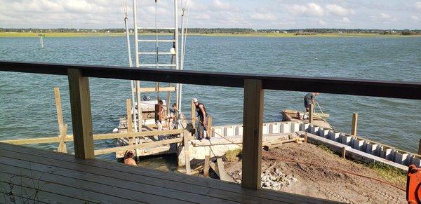 These are some talented guys! Scuba or scaling ladders on floating docks - they can do it all!