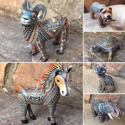 These animals are made from fimo clay. Every color you see is a different piece of clay and not painted.