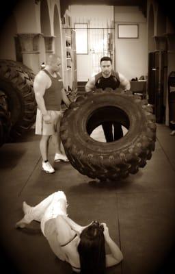 Training client with 350lbs tire