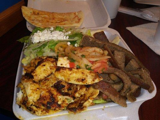 Combination Plate - chicken, gyro, hummus, rice and feta salad.