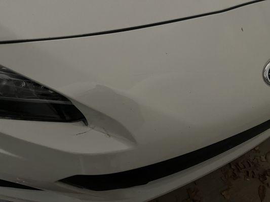 Front bumper damage prior to repair