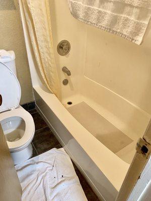 Small tub with no plug have to shove a towel in drain