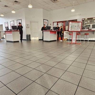 Clean showroom with employees.