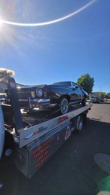 My Car On The Flat bed of tow truck