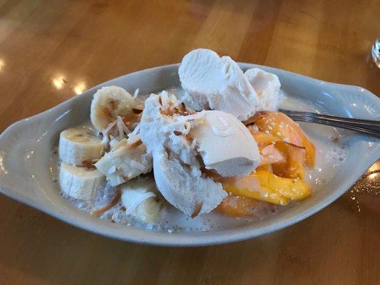 Dessert - GET THIS! Mango over sticky rice in vanilla cream, sprinkled with coconut bits! I love the addition of banana too.