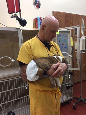 Dr Riegger with one of his pediatric surgery patients in the clinic's ICU ward