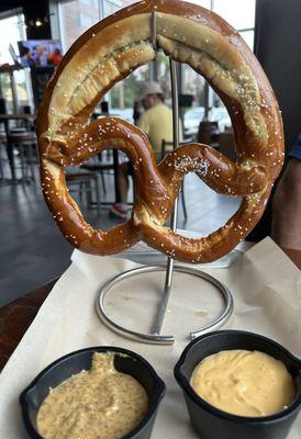 Giant pretzel with beer cheese and whole mustard dipping sauces