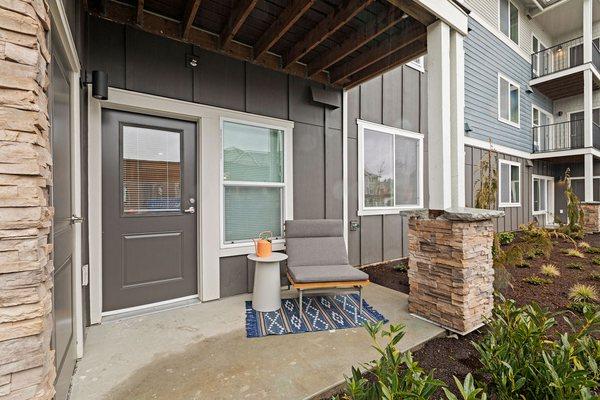 Private balconies and patios with woodland views