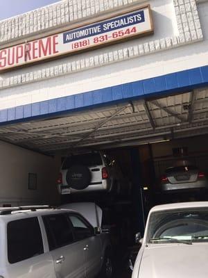 Supreme automotive storefront.