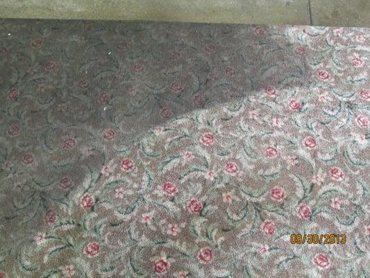 This is the before and during cleaning of a greasy rug from a restaurant dining room.