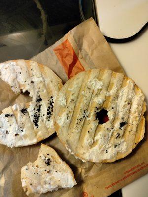 This what I got today when I ordered a bagel toasted with cream cheese.  I immediately saw the black stuff.