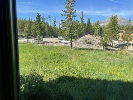 View from either side of the house as well as view from the hot tub (port-o-potties, dumpsters, construction).