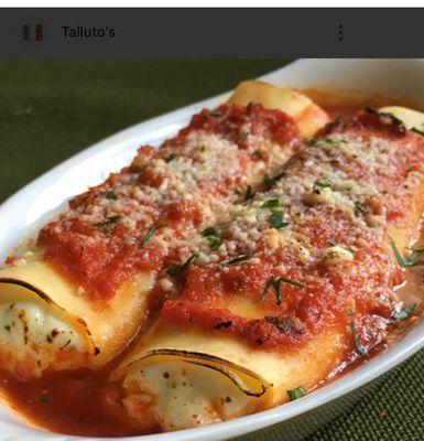 Manicotti is a classic Italian-American dish featuring large, tube-shaped pasta that is typically stuffed with a ricotta