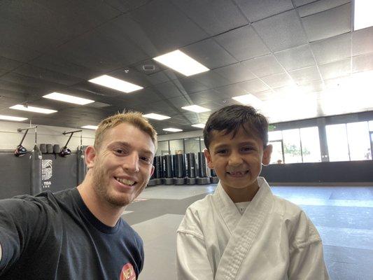 Mr Garrett & Lil Mando. Mr. Garrett is my son's favorite instructor.