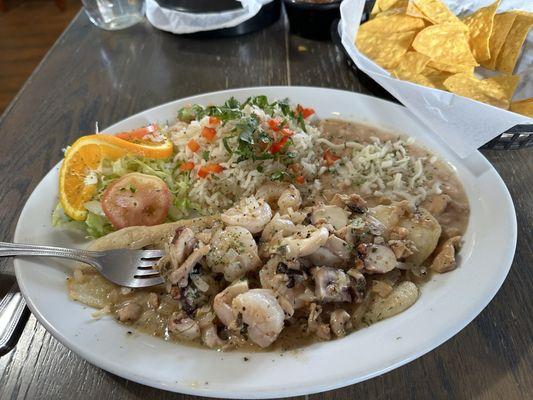 Magaly's fish filet with shellfish