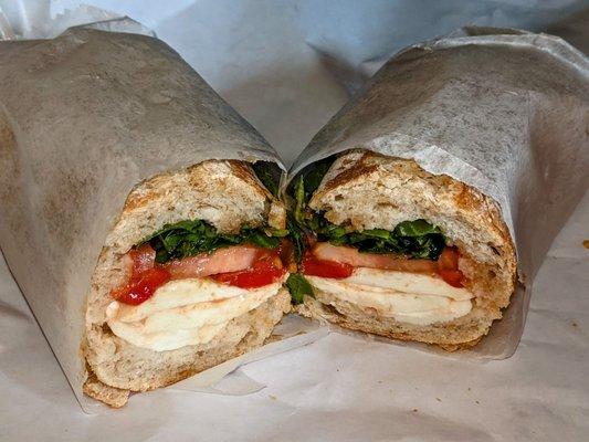 Mozzarella Sandwich (mozzarella, sweet peppers, arugula, tomatoes, vineagrette on Portuguese Bread) $12.99