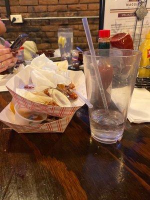 Empty cup. Mine and husbands empty taco plates.