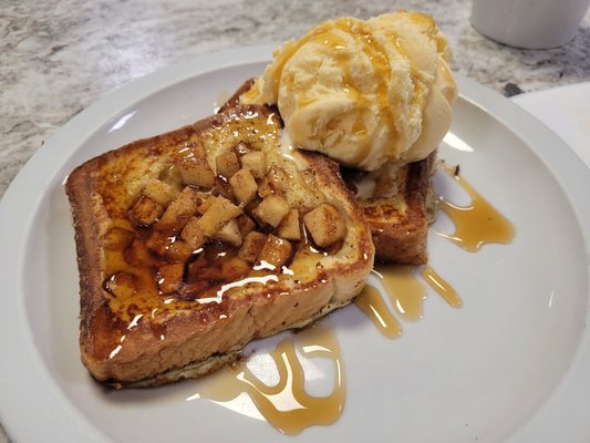 French toast, Real maple syrup, apple cinnamon compote, and a scoop of vanilla ice cream