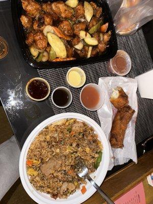 Full spread R5. Yong Chow Combo Fried Rice, C11. General Tso's, Chicken Egg Rolls, sauces!