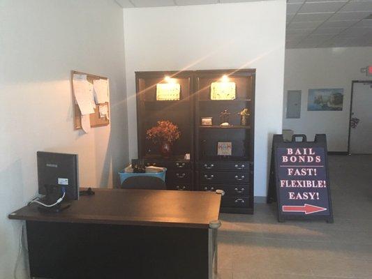 Inside desk where customers can do paperwork under some cold A/C.