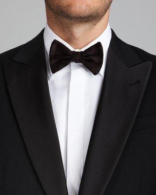 A black tuxedo looks good for any formal occasion.  Buy or rent at Jonathan Reid.