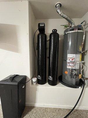 New Water Heater along with Salt and Osmosis Water System from Precision Plumbing.