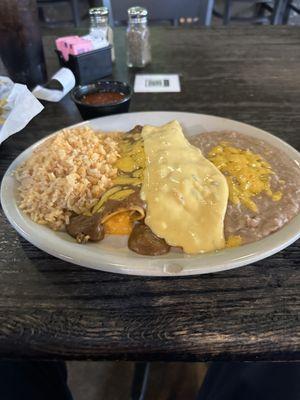 Cheese Enchilada with Chili Con Carne & Beef Enchilada with Queso. Classic, tasty Tex-Mex!