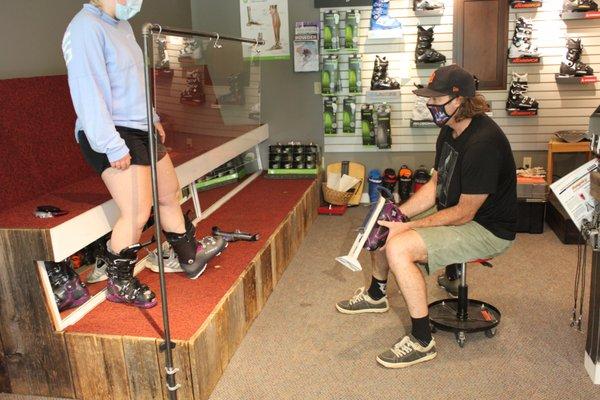 Mike helping a customer find the perfect ski boots at our bootshop, Inner Bootworks in Stowe, Vermont.