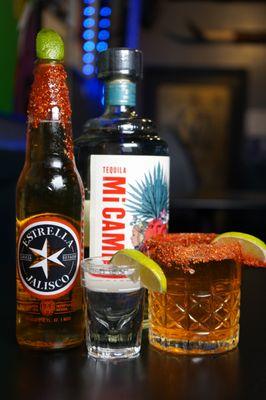 Spicy Rim Job with Estrella Jalisco Lager and Mi Campo Tequila. A spicy twist on the Boiler Maker shot and beer combo.