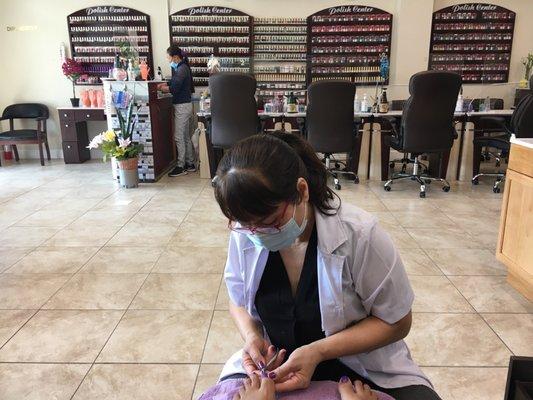 View of the manicure stations across the room.