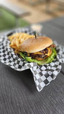 The "Rockhouse Burger" with fries. Small patty.